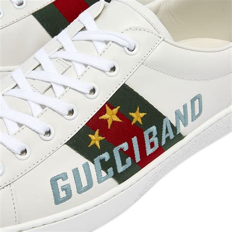 scarpe gucci con scritta gucci